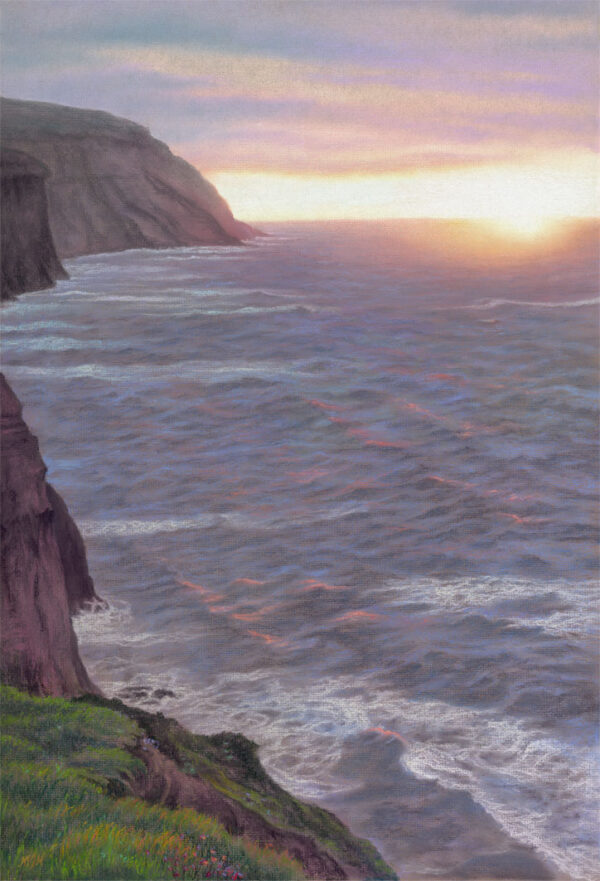 This is a signed limited edition print of an original soft pastel painting by artist Michael Howley. The subject of the painting is a softly atmospheric evening seascape as the sun goes down behind the horizon. There is a white glow at the centre of the sun graduating through soft reds, oranges and pinks which permeate the purple grey clouds above. The pink tones are reflected on the crest of the waves which are otherwise coloured in purple-greys and blue-greys. The view is towards Boulby Cliffs from Staithes with the headland in dark purple-greys to the left.