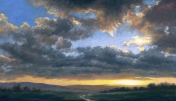 This is a signed limited edition print of an original soft pastel painting by artist Michael Howley. The subject of the painting is a broad evening skyscape with a dark strip of moorland at the bottom. Dark grey clouds roll across a b lue sky and below them the sky glows with the colours of sunset. The bright sun to the right creates highlights on the edges of clouds above.