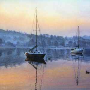 This is a signed limited edition print of an original soft pastel painting by artist Michael Howley. The subject of the painting is two boats in the warm pink light of dawn against the blue hills surrounding Lake Windermere.