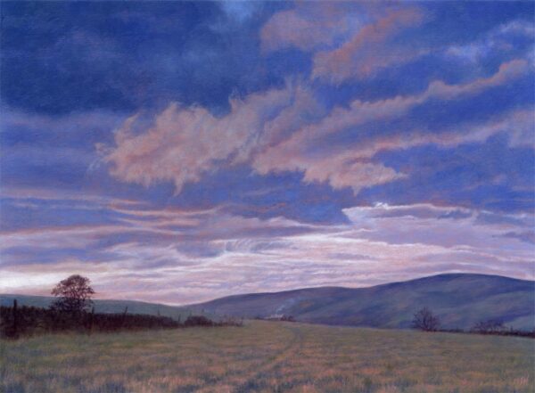 This is a signed limited edition print from an original oil painting by artist Michael Howley. Primarily a skyscape,it is a view across fields and hills to a serene evening sky with indigo blue clouds edged in pink tones which reflect the afterglow of sunset.