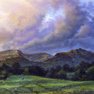 This is a signed limited edition print from an original soft pastel painting by artist Michael Howley. A scene across fields to the Langdales beyond with a rolling evening sky of clouds in blues, purples and pinks. The evening light casts shadows across the distant hills and foreground fields and there is a general sense of movement.