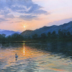 This is a signed limited edition print from an original soft pastel painting by artist Michael Howley. In this lakeland scene, a swan floats serenely by a reflection of the setting sun. The soft blue clouds, rosey glow of the setting sun and the blue-grey hues of the darkening hills are reflected in the lake with deepening tones in the foreground.